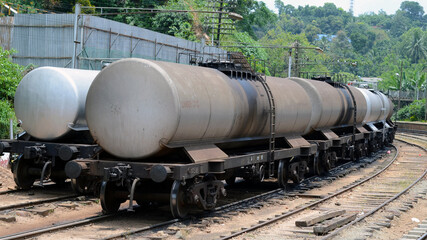 Double oil tankers in the railway yard of station. 