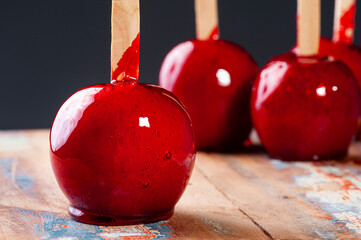 .Love Apple. Red caramel covered apple dessert.