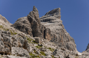 Campanile di Vallesinella, Punta Massari summits, as seen from the trail to Rifugio Tuckett, Brenta Dolomites, Italy.