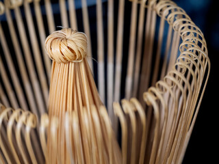 Macro close up of a chasen matcha whisk