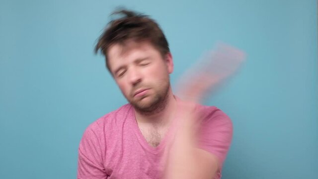Young man hit himself on the face