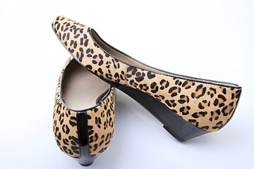 leopard skin shoes on display stock photo