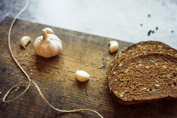 Fototapeta na wymiar rye bread with garlic and spices on a gray background 5