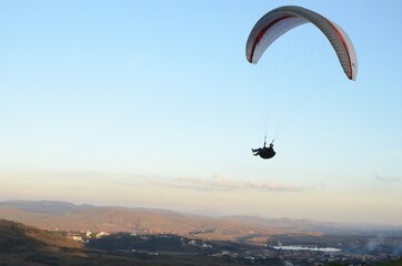 Paragliding at sun set in Topo do Mundo (translated to Top of the World) in Minas Gerais