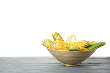 Bowl with corn on wooden table isolated on white background