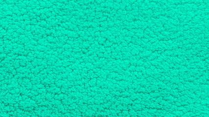 Fototapeta na wymiar Turquoise bath towel texture close up - high resolution photo