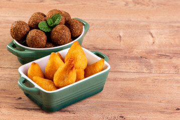 Brazilian fried savory snack mix with coxinha and fried kibbeh