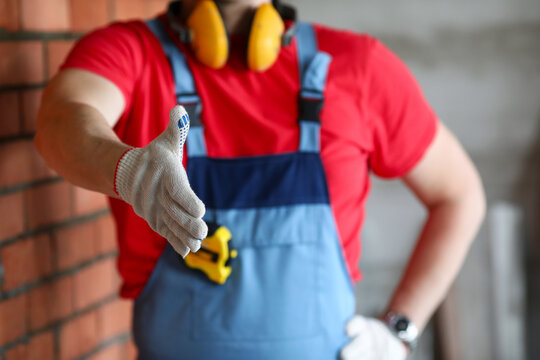 Man in gloves and vests
