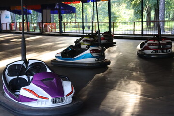 aoutodrome in fun park with vehicles