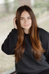 Young Girl with Long Flying Hair, on light Background. High quality photo