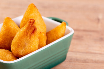 traditional Brazilian fried snack made with chicken known as 