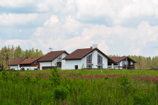 image of residential houses in the field