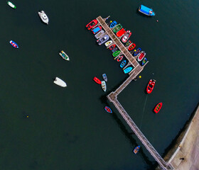 Fototapeta na wymiar Small Boats Moored in Galicia. Spain. Drone Photo