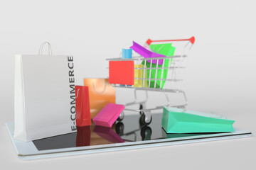 Shopping cart on a tablet computer and paper bag with E-COMMERCE text. 3D rendering