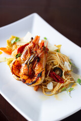 grilled shrimp spaghetti pasta with black olive,  mozzarella, Parmesan cheese, with olive oil