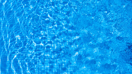 water ripples in a swimming pool in summer