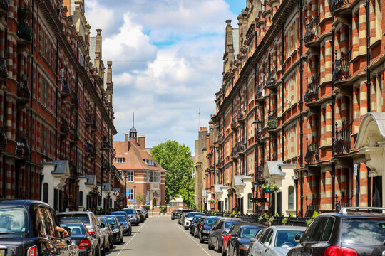London Streets.  A view down Glentworth Street, Marylebone, London NW1 towards Ivor Place. The stunning Edwardian red brick mansion blocks have wrought iron Art Nouveau balconies.