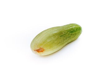 a fresh green cucumber but slightly deformed with an isolated white background