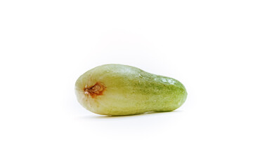 a fresh green cucumber but slightly deformed with an isolated white background