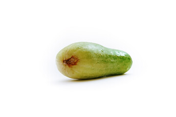 a fresh green cucumber but slightly deformed with an isolated white background