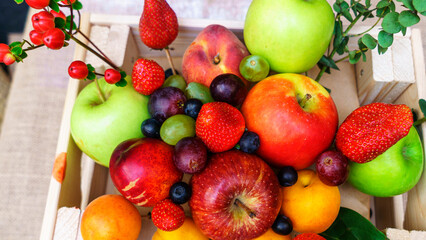 Fototapeta na wymiar Close-up view of large collection fresh fruits useful for health. Harvesting concept. Fresh background.