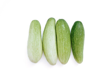 fresh green cucumbers with a background isolated white background