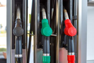 Fuel dispensing nozzles at the gas station