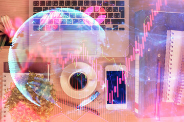 Double exposure of business theme hologram over desktop with phone. Top view. Mobile international trade connection concept.