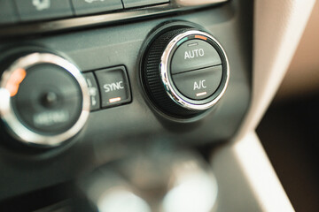 close-up car air conditioner ventilation system control knobs