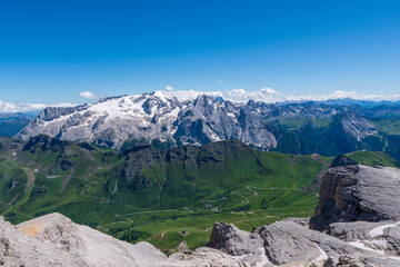 Fototapeta na wymiar Marmolada massif, Dolomiti, Itay. Beautiful view over the Marmolada glacier and Pordoi Pass from gruppo Sella and Piz Boe peak