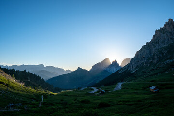 Fototapeta premium Evening view of the Pordoi Pass in the Italian Dolomites at sunset.