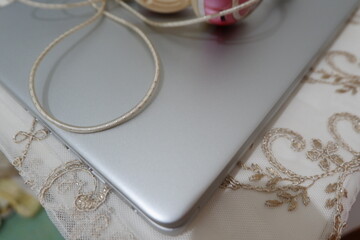 Laptop and headset on the table