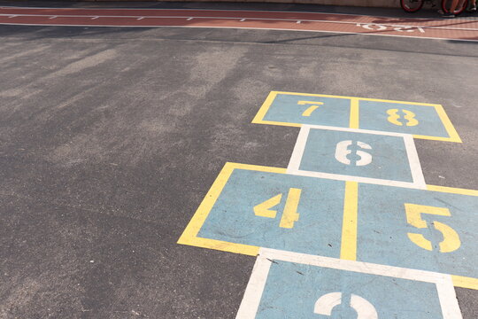 Abstract shot of hopscotch court on playground in school yard