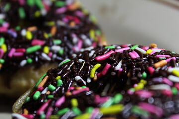 Baked chocolate doughnuts with chocolate glaze. toning. selective focus