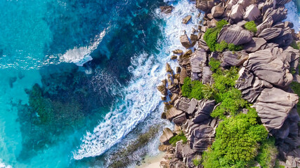 Aerial view of tropical island with sea, vegetation and shoreline