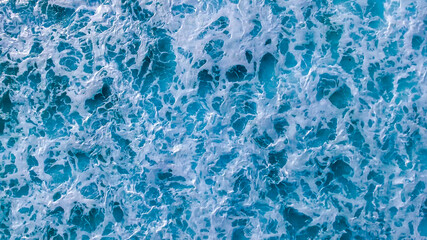 Obraz premium Coast as a background, aerial top view. Turquoise water background from top view. Summer seascape from air