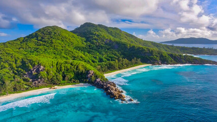 Fototapeta na wymiar La Digue, Seychelles Island. Amazing aerial view of beach and ocean from a drone