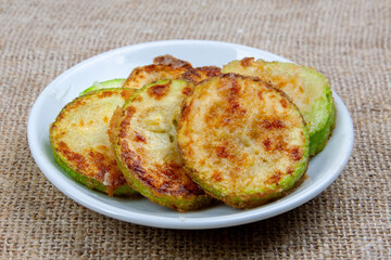 fried zucchini on a plate
