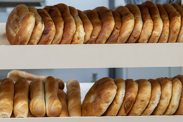 bread and pita bread on the counter in the store