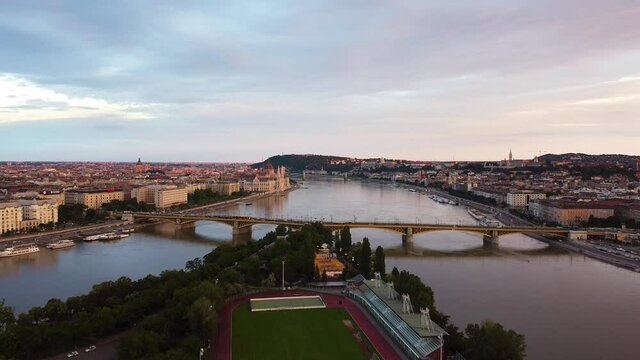 Panoramic view of chain bridge,parliament and soccer field on island in Budapest,Hungary