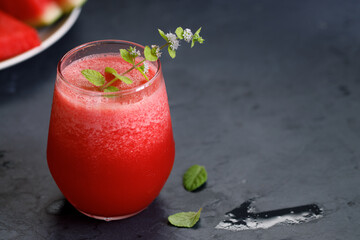 Watermelon drink on dark background