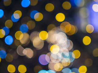 Fototapeta premium Abstract beautiful background colorful bokeh of christmas decoration lights