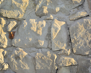 Stone wall. Foundation under the house