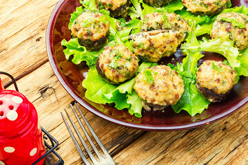 Mushrooms stuffed with meat.