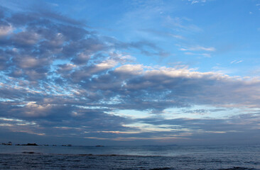Obraz premium View of dawn at the seaside with the dramatic cloudscape, Tioman Island