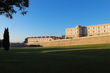 Fototapeta premium Beautiful view of fortress wall of Cartagena, Spain in the light of the morning sun
