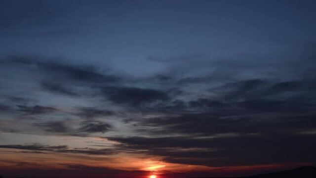 Beautiful romantic, romantic sunset with beautiful blurring clouds