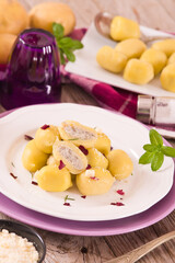 Potato gnocchi stuffed with radicchio and ricotta.	