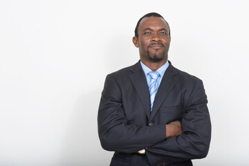 Portrait of handsome bearded African businessman in suit