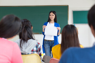 College teacher and students in the classroom